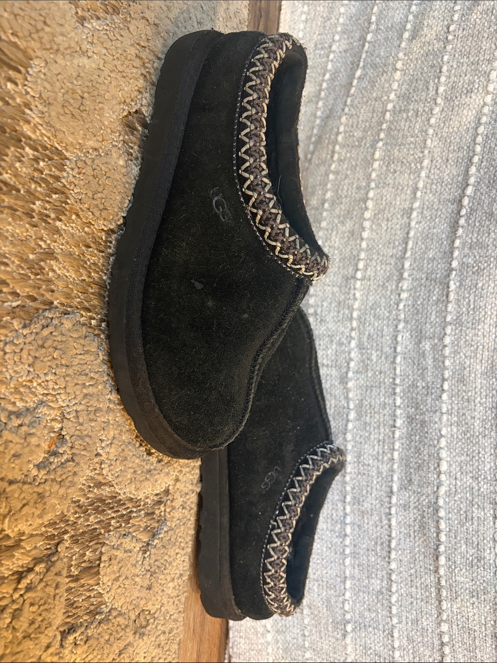 UGG women’s Black Suede Slip-On Loafers with Braided Trim